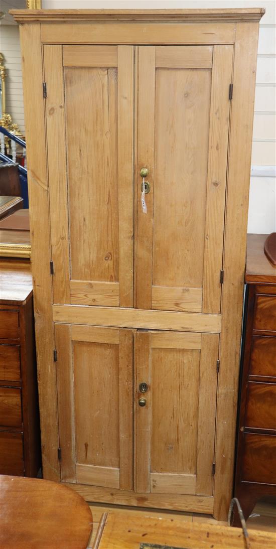 A French four door pine cupboard W.79cm